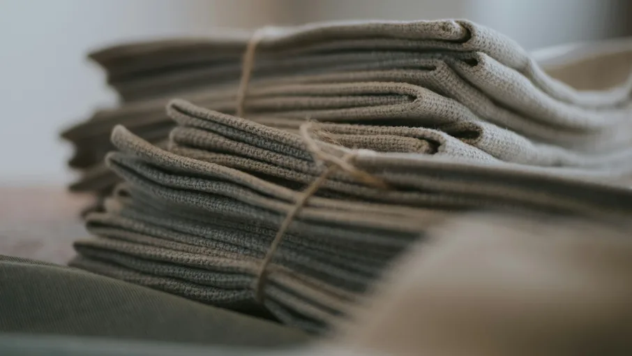 A stack of folded neutral cloth