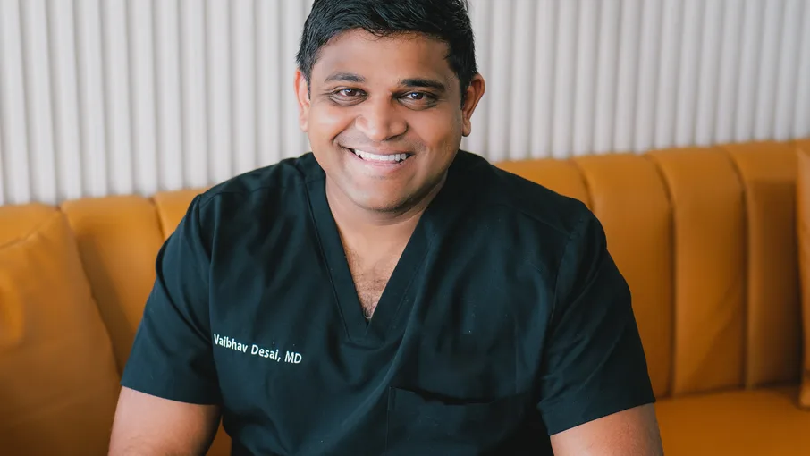 Dr. Vaibhav Desai, MD, seated at Lux Lipo in Jonesboro